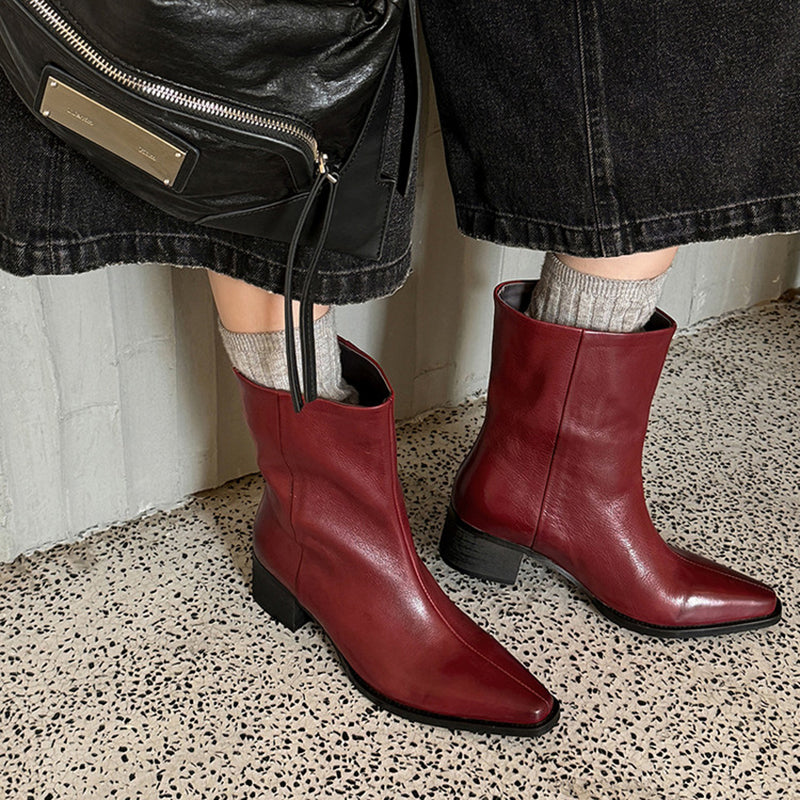 Bottes de cheville à bout pointu en cuir de mouton pour femmes en noir/marron