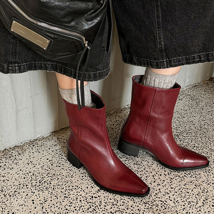 Bottes de cheville à bout pointu en cuir de mouton pour femmes en noir/marron