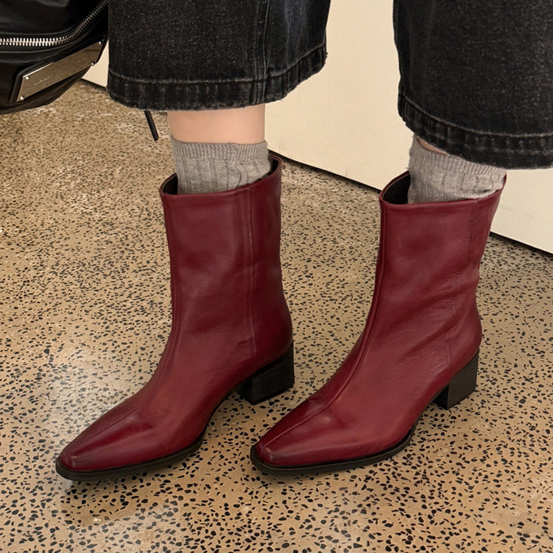 Bottes de cheville à bout pointu en cuir de mouton pour femmes en noir/marron