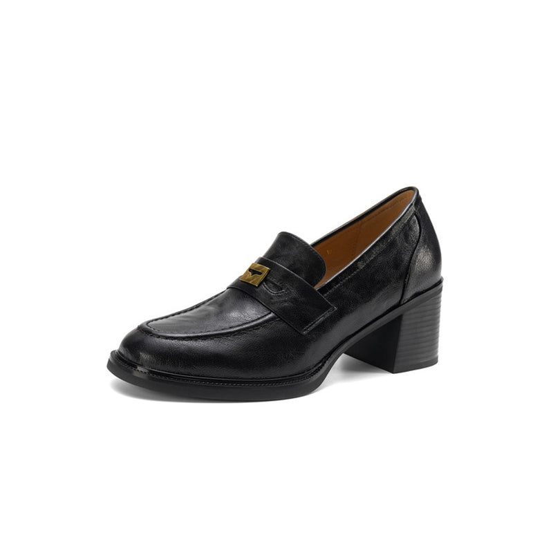 Mocassins en cuir de mouton à bout rond et talon bloc de 65 mm avec décoration en métal en marron/noir