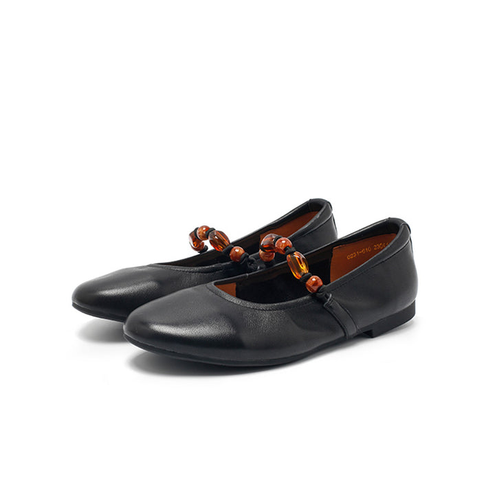 Ballerines Mary Jane en cuir nappa avec sangle perlée, à bout amande en noir/abricot clair
