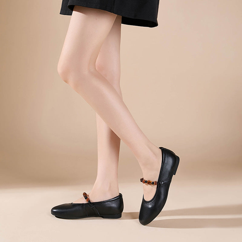 Ballerines Mary Jane en cuir nappa avec sangle perlée, à bout amande en noir/abricot clair