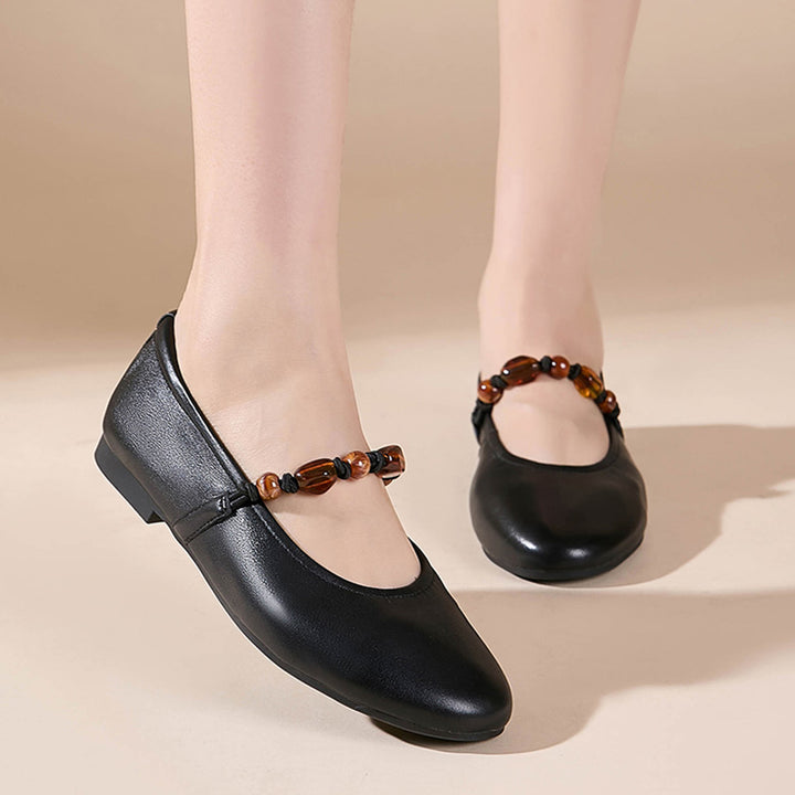 Ballerines Mary Jane en cuir nappa avec sangle perlée, à bout amande en noir/abricot clair