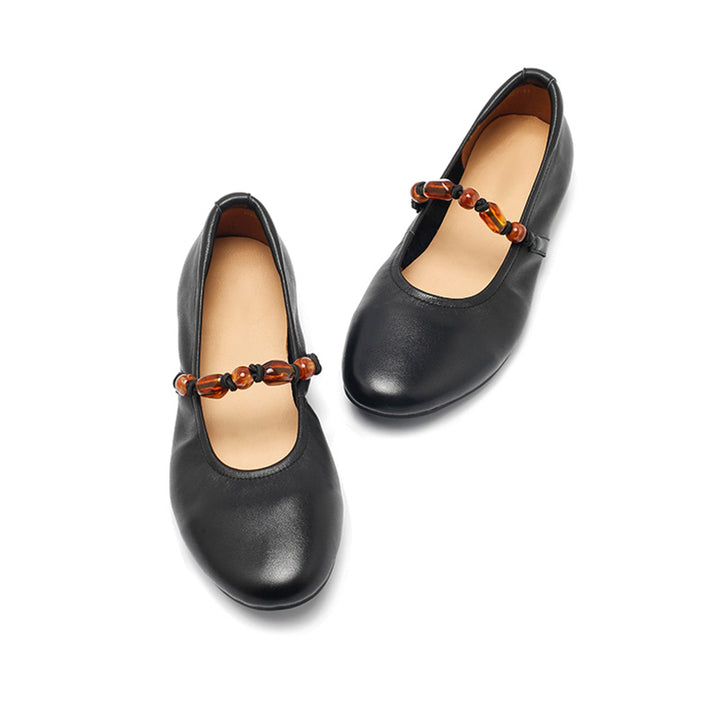 Ballerines Mary Jane en cuir nappa avec sangle perlée, à bout amande en noir/abricot clair
