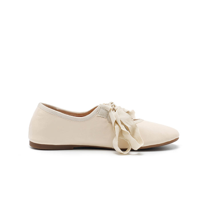 Ballerines en cuir souple faites à la main avec nœud en ruban en beige/noir/café